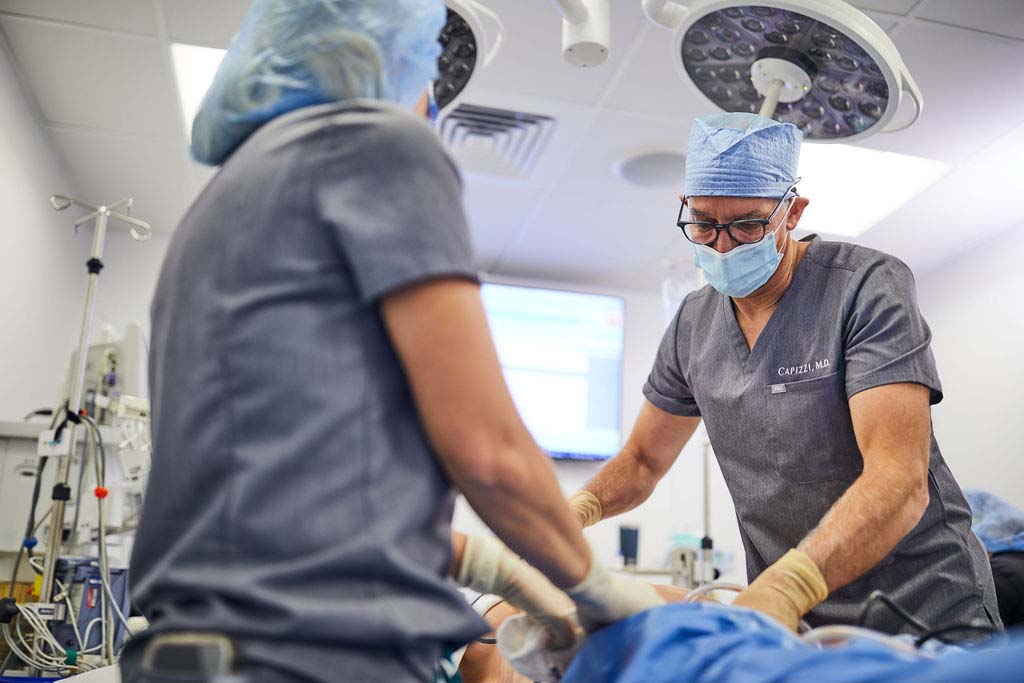 Dr Capizzi preforming a combination Liposuction using both Ultrasonic and Power-Assisted methods.