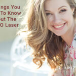 The words "7 Things You Need To Know About The HALO Laser" with a smiling woman with smooth and clear facial skin.