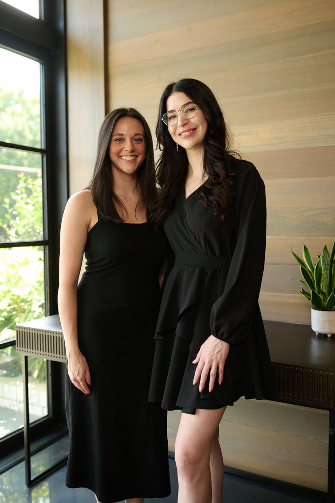 Aestheticians at Capizzi MD posing in the lobby of the Charlotte office